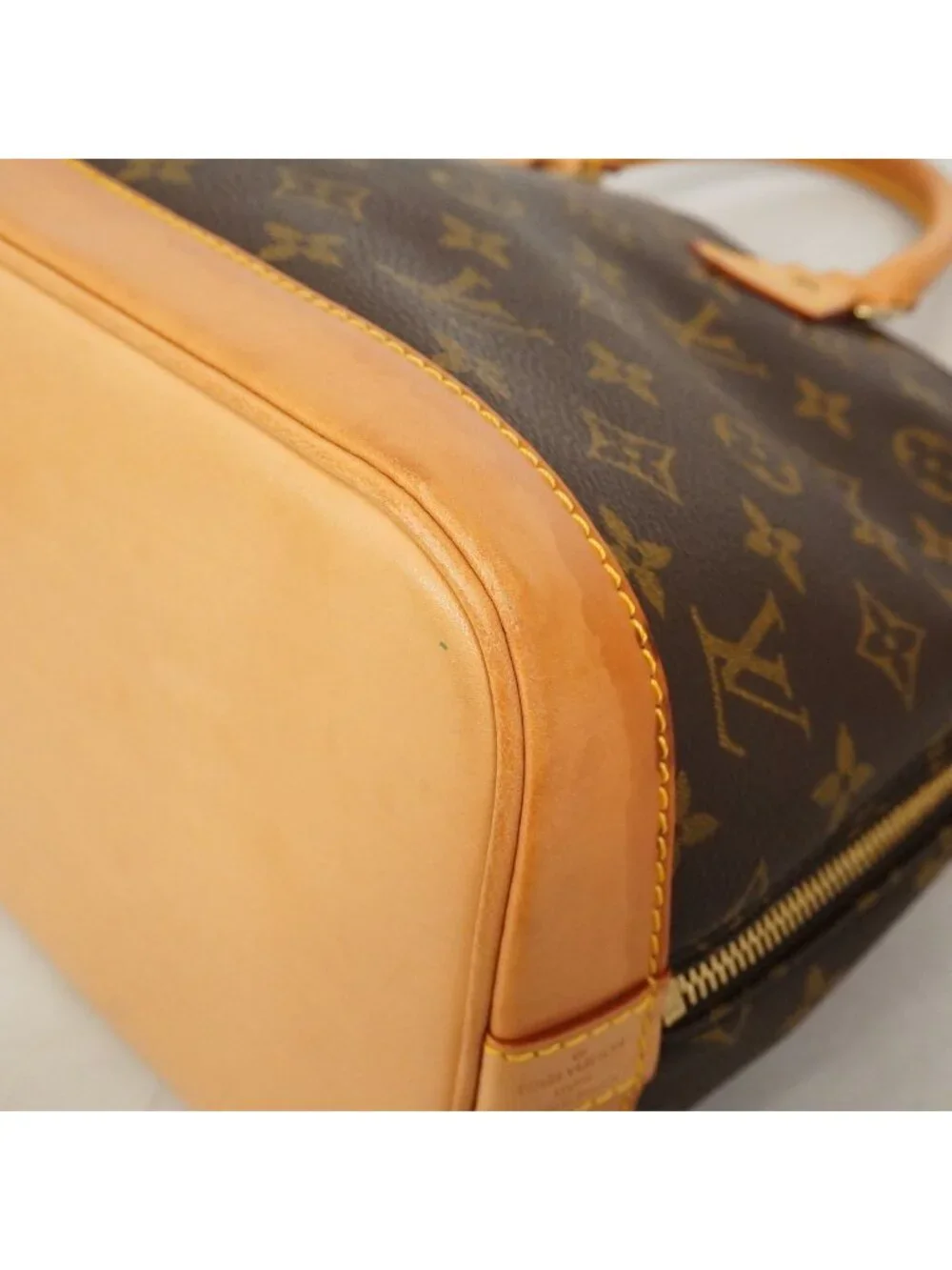 Louis Vuitton Monogram Alma Brown Handbag